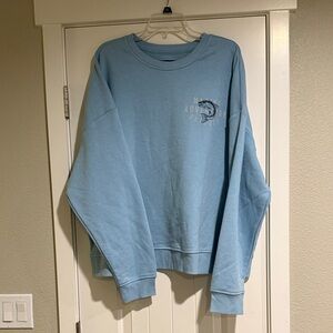Original Use Light Blue Crewneck Sweatshirt with Small Chest Graphic
